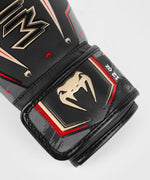 Load image into Gallery viewer, Venum Elite Evo Boxing Gloves - Black/Gold/Red
